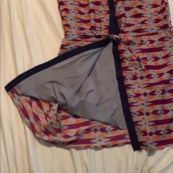 This is a patterned, collared button down dress - Picture 3 of 5